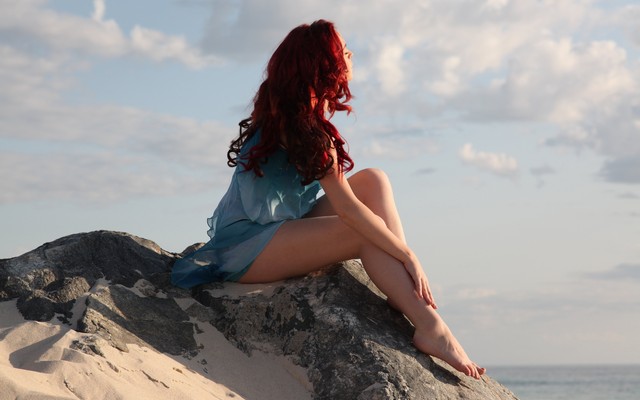 5609x3534 pix. Wallpaper girl, legs, sea, sky, sitting, clouds, red hairs