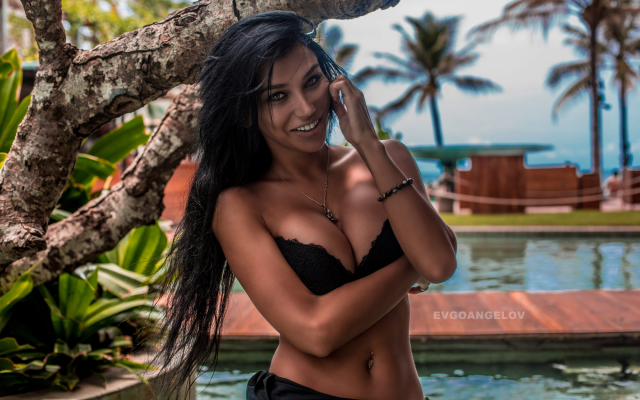 2000x1333 pix. Wallpaper black hair, smiling, tanned, cleavage, black bra, pierced navel, pool, tropics, hot