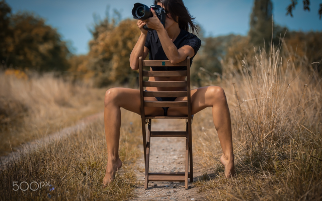 2048x1428 pix. Wallpaper camera, tanned, legs, chair, brunette, outdoors, sitting