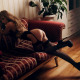 masha maksimova, kneeling, couch, ass, brunette, black stockings, high heels, garter belt wallpaper