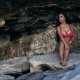 sitting, tanned, tattoo, lingerie, rocks, black hair, big titas, busty wallpaper