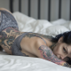 in bed, ass, bottom up, tattoo, lingerie, blue hair, dyed hair, panties wallpaper