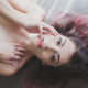 satin suicide, suicide girls, model, face, strategic covering, long hair, dyed hair wallpaper