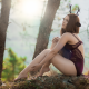 blue snow, model, brunette, lingerie, bodysuit, antlers, sitting, forest, trees, legs wallpaper